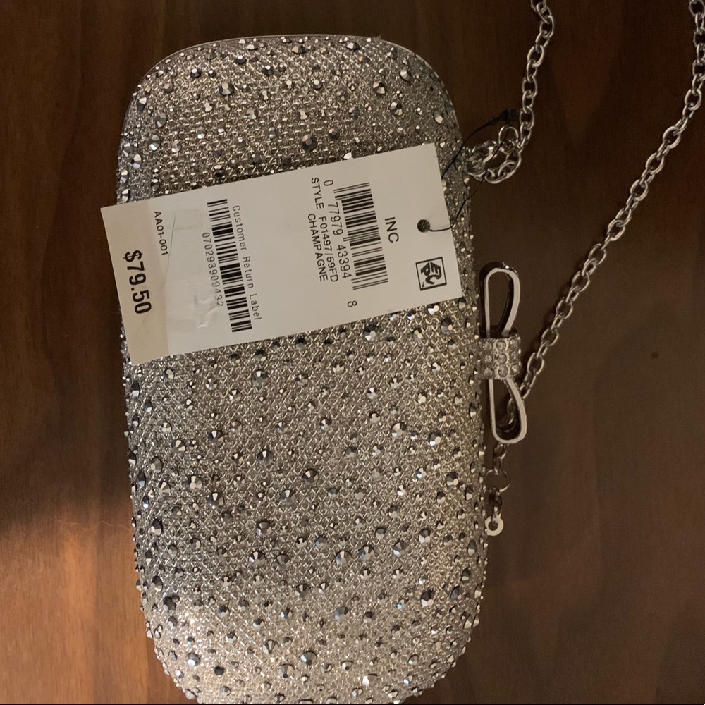 Glittery INC clutch with chain